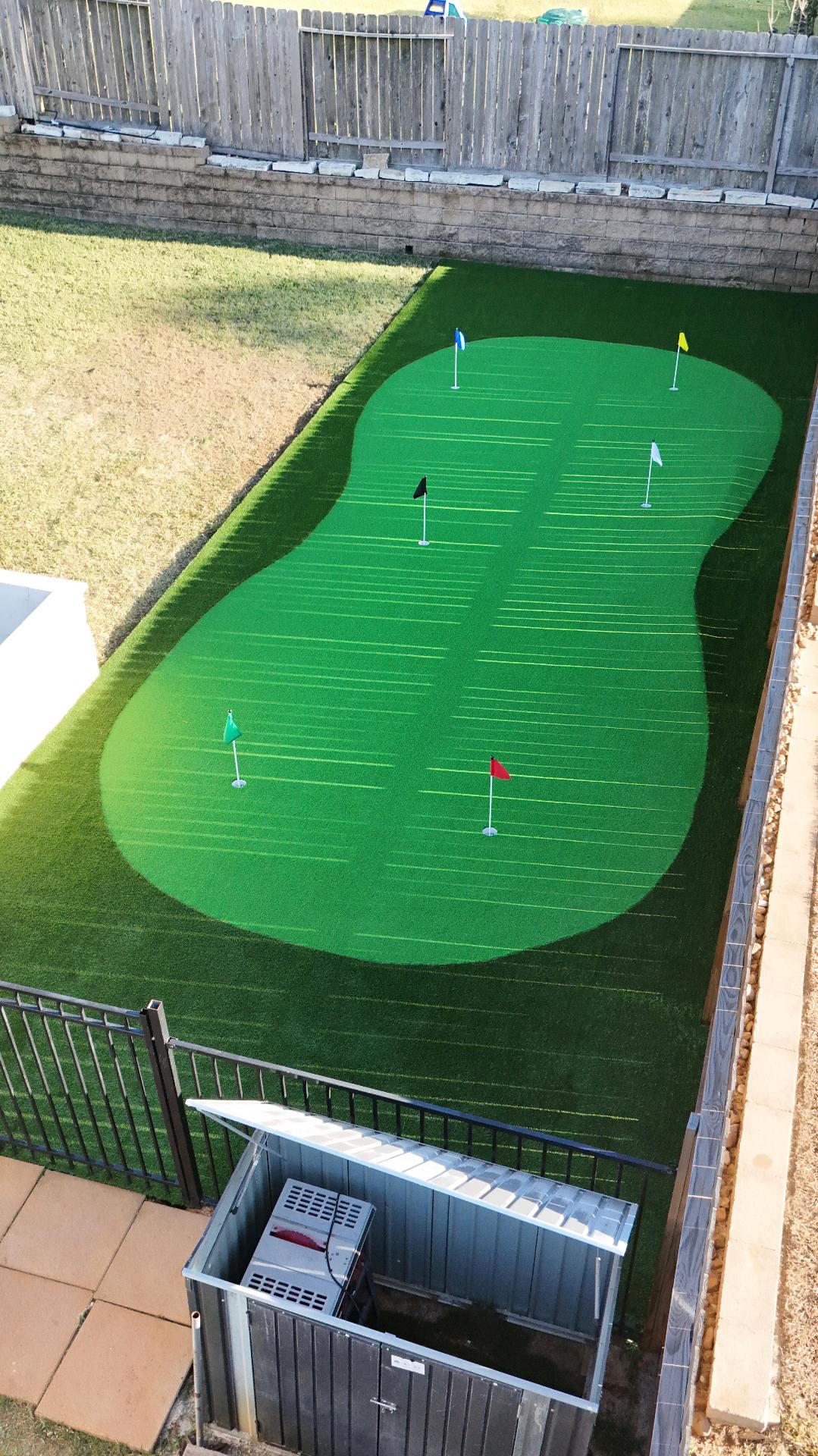 Custom backyard putting green installation in Houston