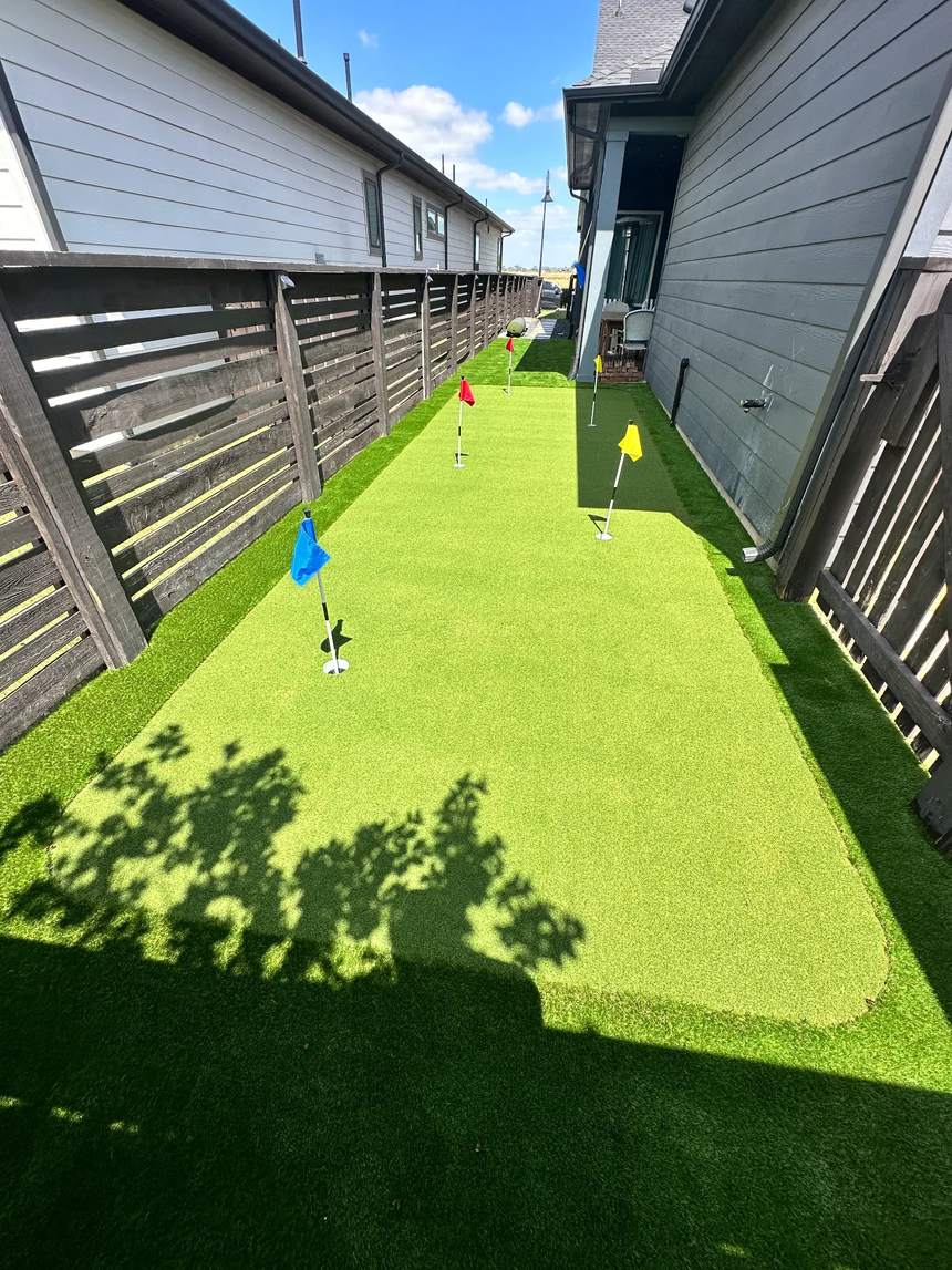 Artificial turf in a narrow side-yard pet area
